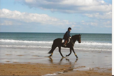 Looking dressage-y at the beach in 2008.