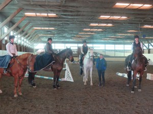 UNH students riding school owned horses Clementine, Whisper and Morocco participated in a clinic with UNH graduate Nancy Guyotte.  